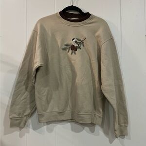 Cream Sweater with Embroidered Bird Design